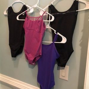 4 leotards,3 skirts/tutus, 2 dance shorts